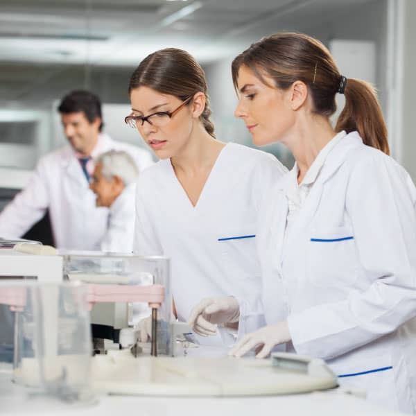 Volpi Scientists Analyzing